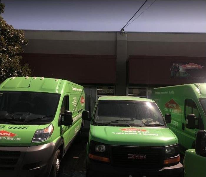SERVPRO vehicles in front of SERVPRO office; stocked with equipment and ready to go